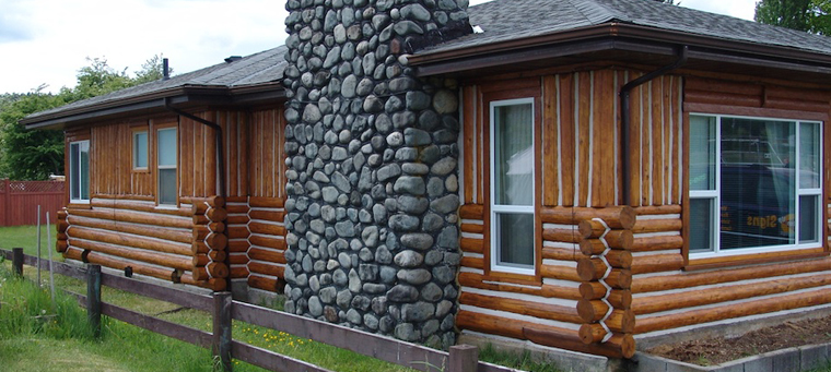 Log home exterior after restoration